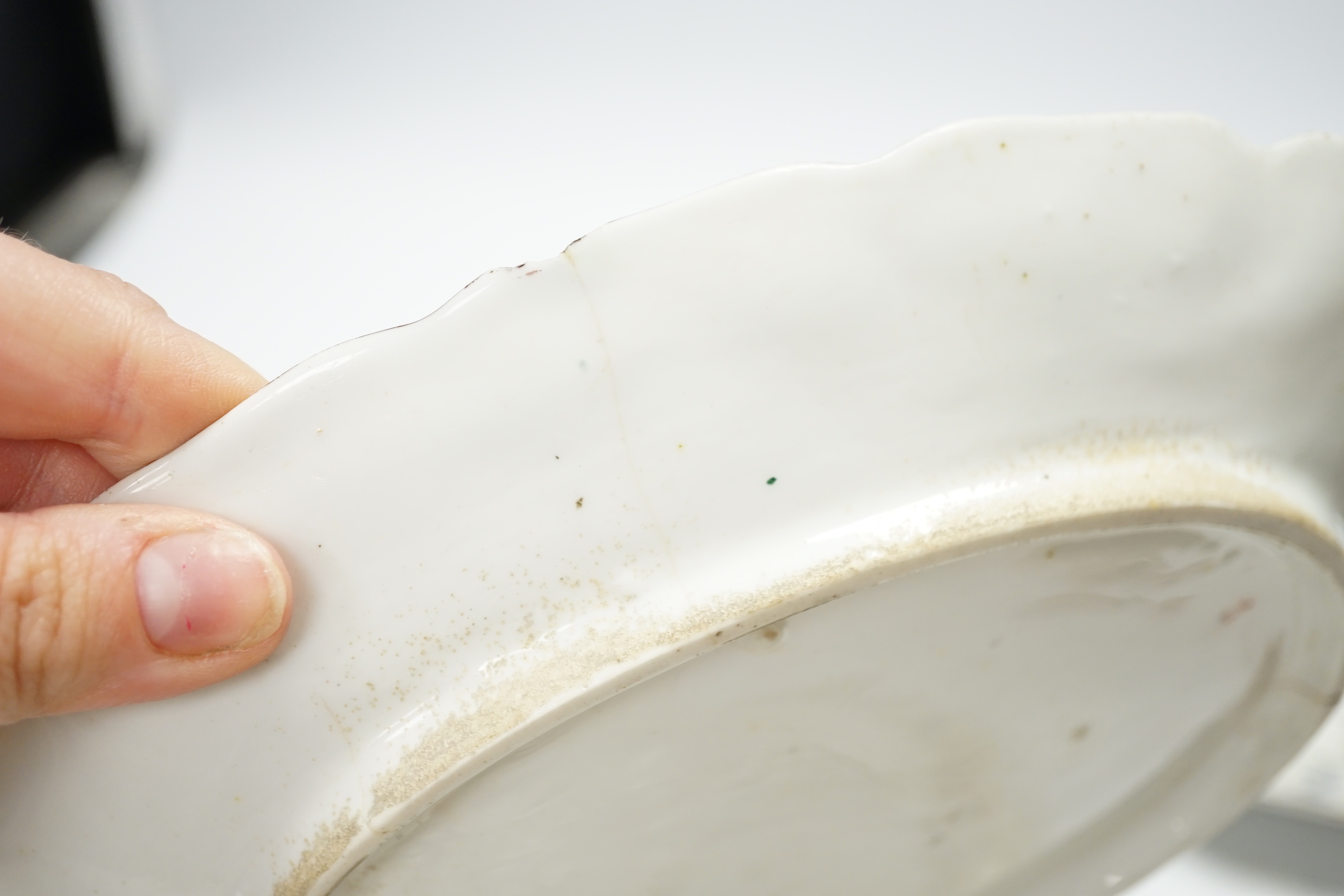 A Chelsea red anchor plate and silver shape dish, c.1756 and a Chelsea gold anchor plate, 1760-5, oval dish 20cm wide